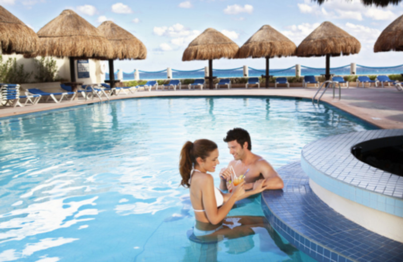 Relax in the Pool at Barcelo Tucancun Beach