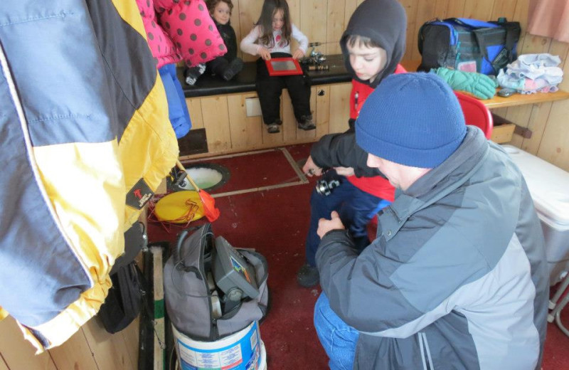 Ice fishing at Woodland Beach Resort.