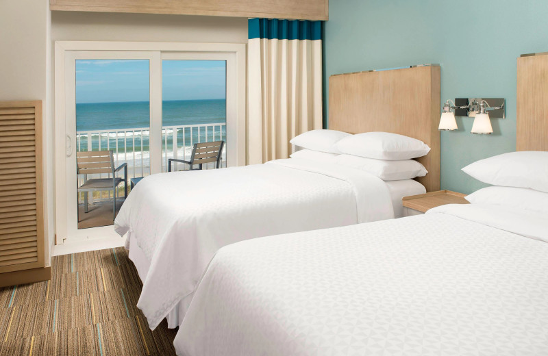 Guest room at Four Points by Sheraton Jacksonville Beachfront.