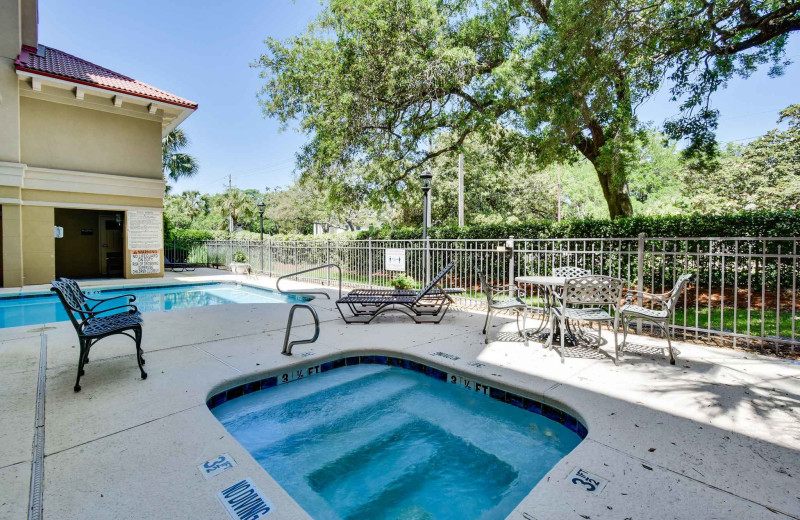 Outdoor pool at Real Escapes Properties - 760 Ocean Blvd 203.