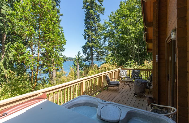 Rental deck with hot tub at Sequim Valley Properties.