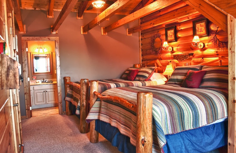 Cabin bedroom at Great Cabins in the Smokies.