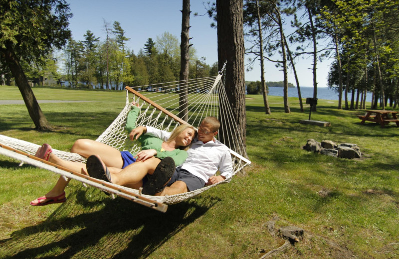 Couple in hammock at Bluff Point Golf Resort.