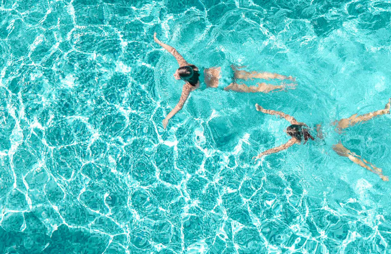 Swimming in pool at Southern Oaks Inn.