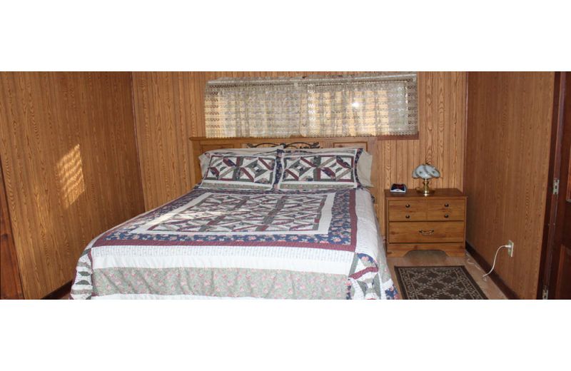 Cabin bedroom at Hocking Hills Backwoods Retreat.