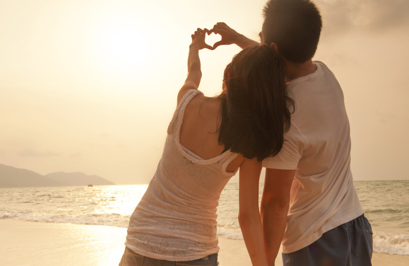 Couple on beach at CBVacations.com