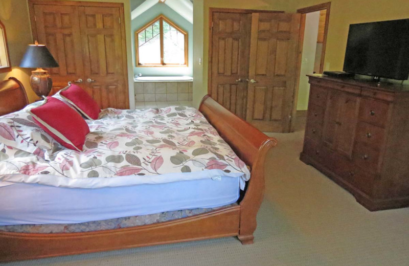 Rental bedroom at All-Season Cottage Rentals.