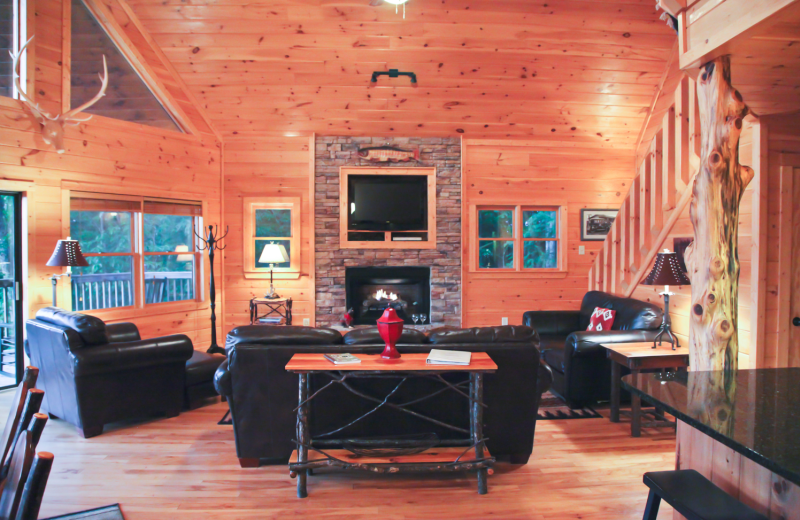 Cabin living room at Mountain Getaway Cabin Rentals.