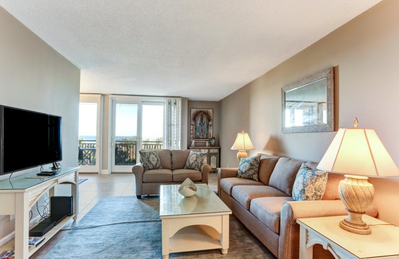 Rental living room at Amelia Rentals and Management Services.