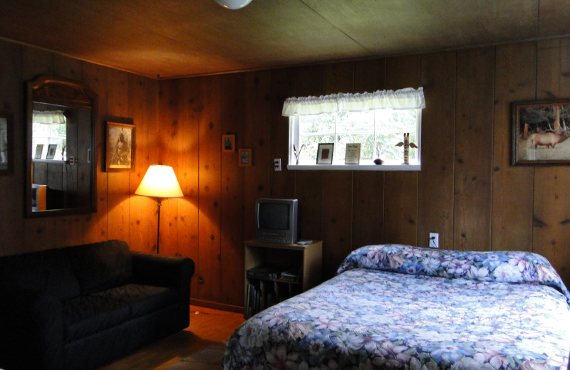 Cottage bedroom at Shakti Cove Cottages.