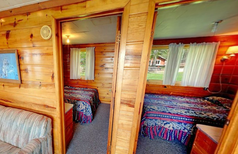 Cabin bedrooms at Hiawatha Beach Resort.