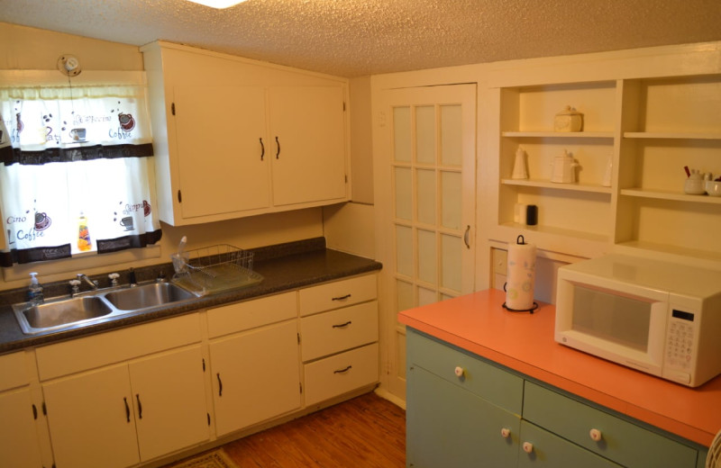 Cabin kitchen at Mulberry Mountain Lodging & Events.