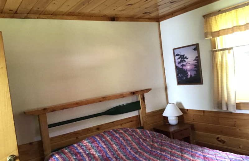 Cabin bedroom at Driftwood Resort.