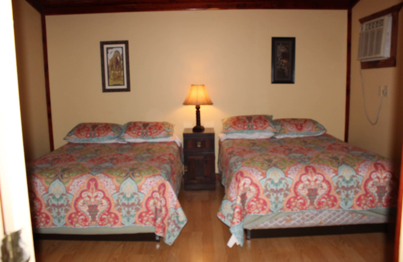 Cabin bedroom at The Exotic Resort Zoo.