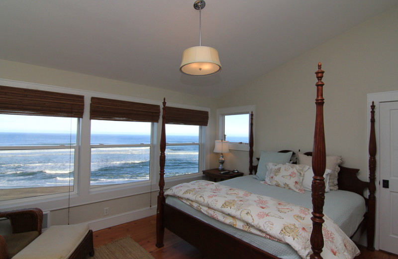 Vacation rental bedroom at Beachfront Vacation Rentals.