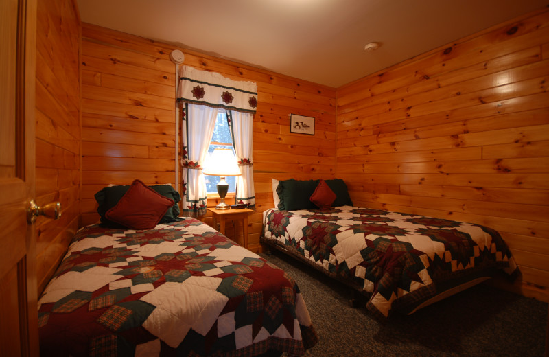 Cabin bedroom at Cabins at Lopstick.