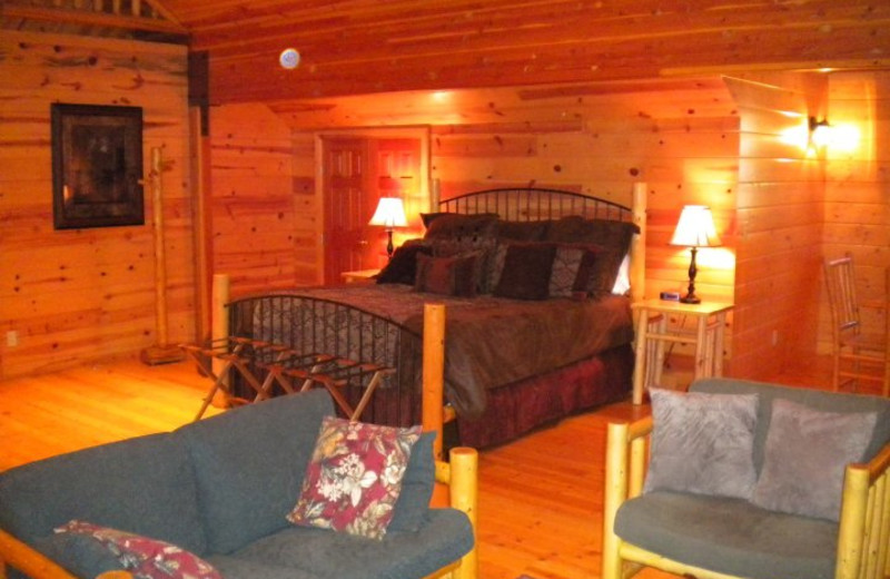 Cabin bedroom at Mountain Springs Lodge.