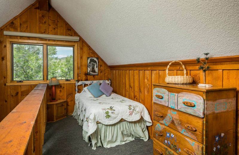 Cabin bedroom at The Glen Eden Resort.