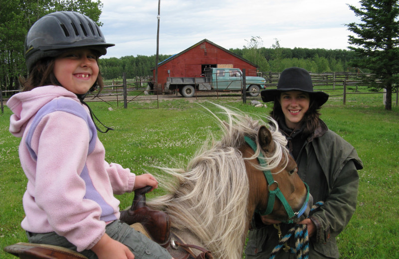 Family riding at Trailhead Ranch.