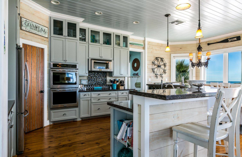 Rental kitchen at Gary Greene Vacation Rentals.