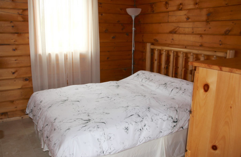 Cabin bedroom at Fernleigh Lodge.