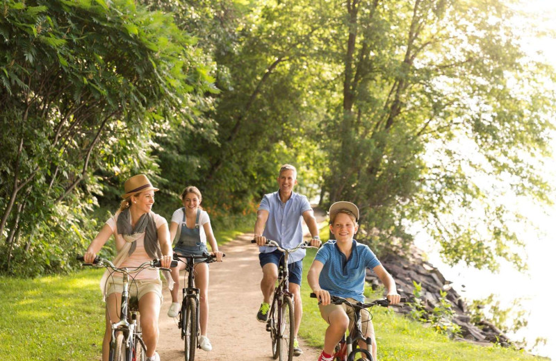 Family biking at Fairmont Le Chateau Montebello.