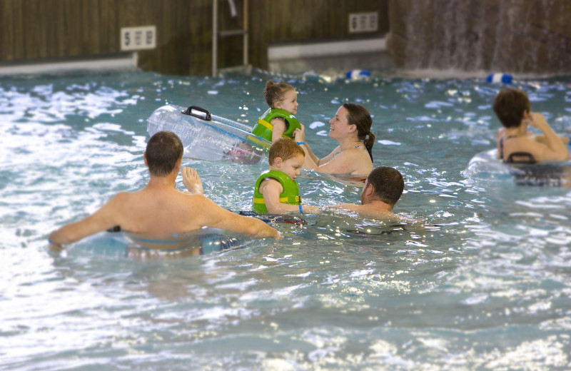 Family swimming at Spa services at Hope Lake Lodge & Indoor Waterpark.