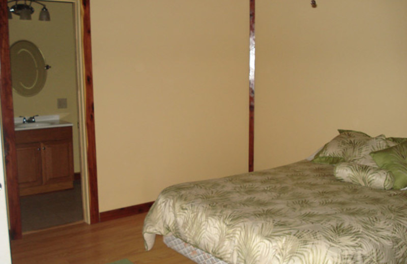 Cabin bedroom at The Exotic Resort Zoo.