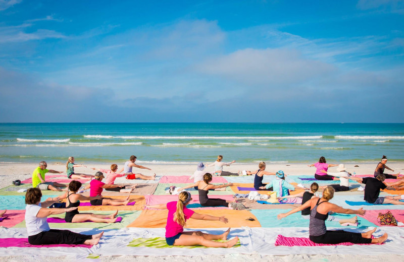 Beach yoga at Tropical Shores Beach Resort.