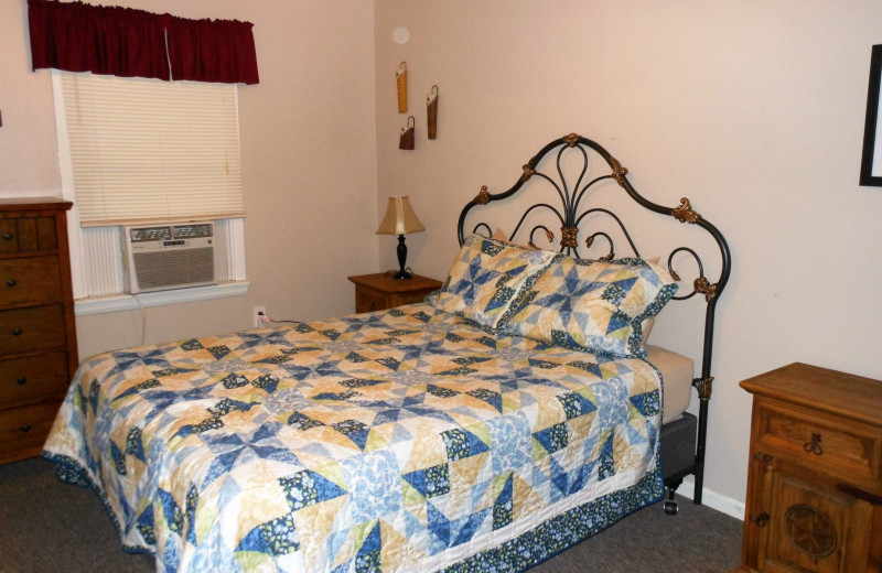 Cabin bedroom at Heart of Texas Lake Resort.