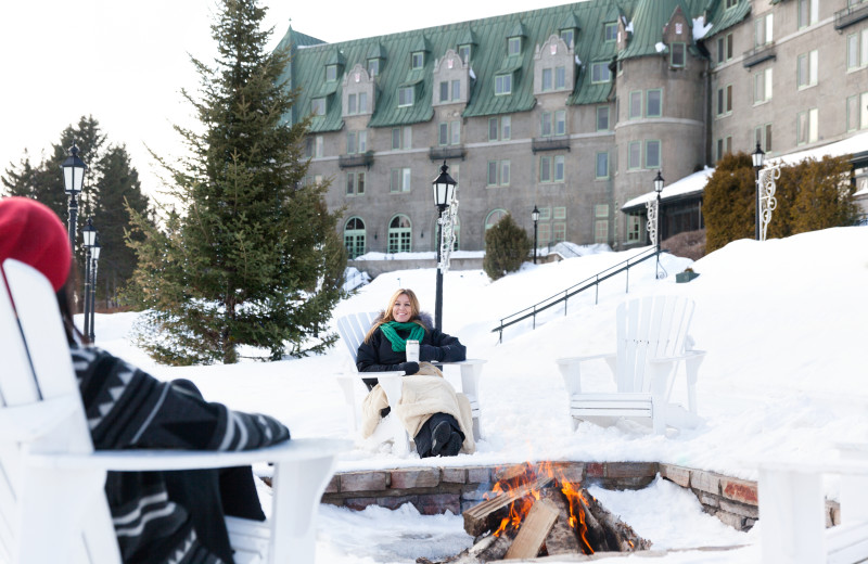 Relaxing by the fire at Fairmont Le Manoir Richelieu.