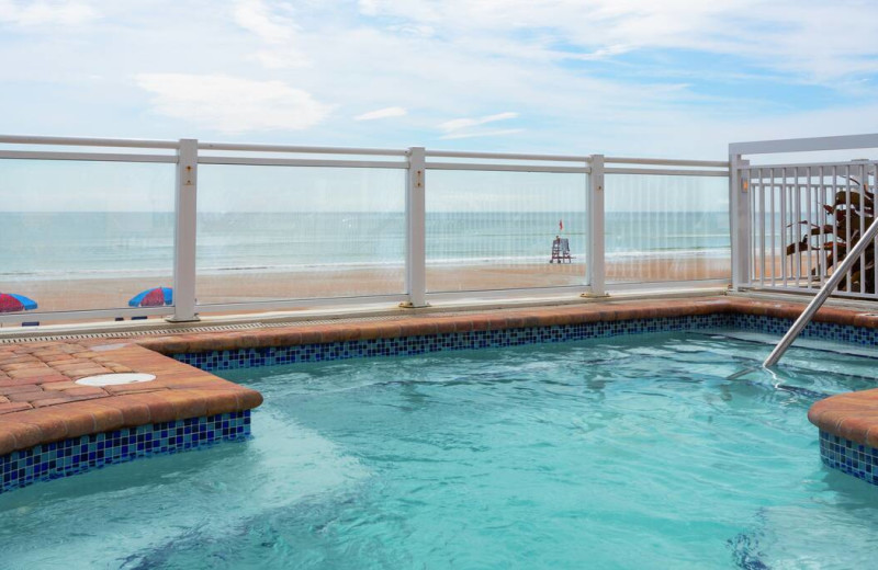 Outdoor pool at Hilton Garden Inn Daytona Beach Oceanfront.