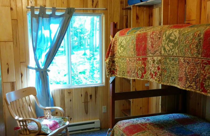 Cottage bedroom at Woodlawn Resort.