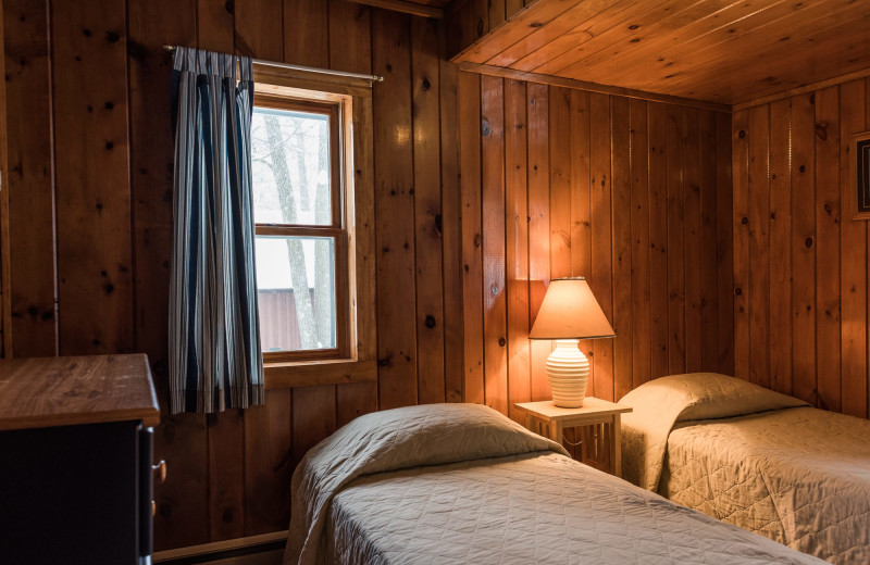 Cabin bedroom at Pitlik's Sand Beach Resort.