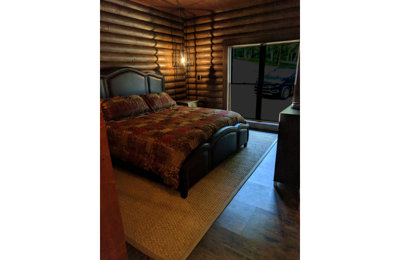 Cabin bedroom at Chateau Lake Logan.