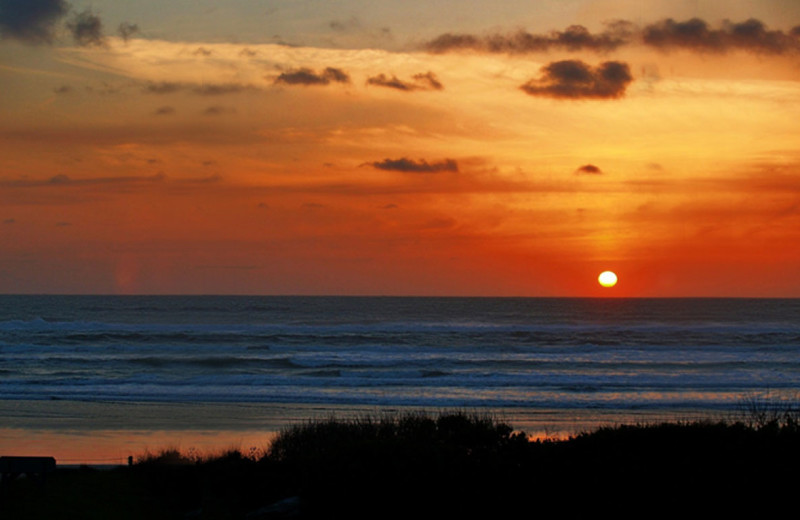 Beach sunset at Rivertide Suites Hotel.