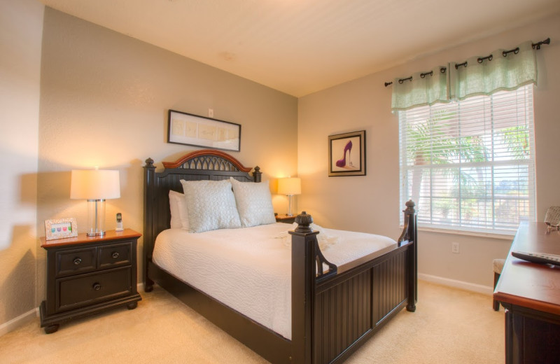 Guest bedroom at Orlando Luxury Escapes Vacation Rentals.