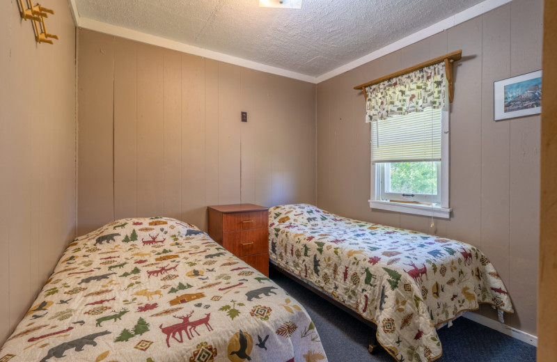 Cabin bedroom at Rising Eagle Resort.