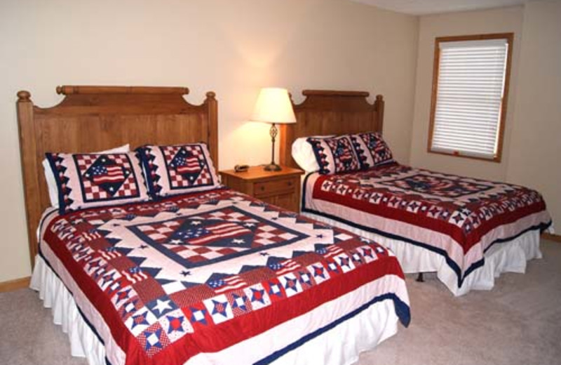 Vacation rental bedroom at Snowshoe Properties Management.