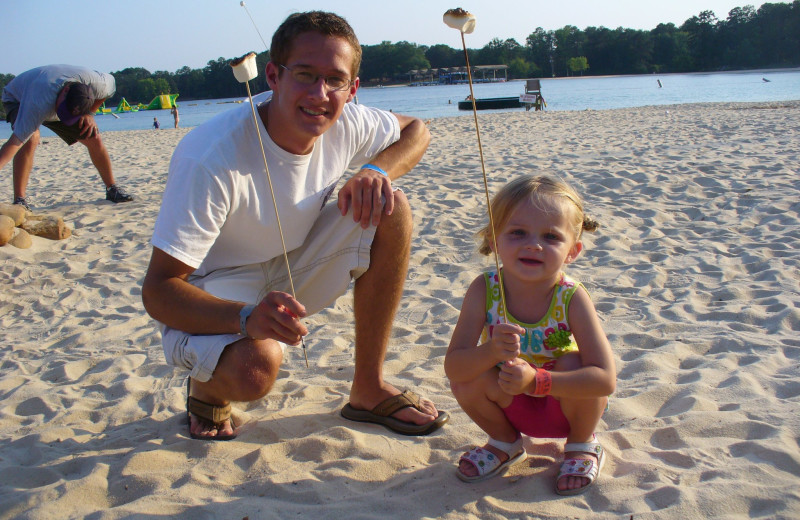 Family on the beach at Callaway Gardens.