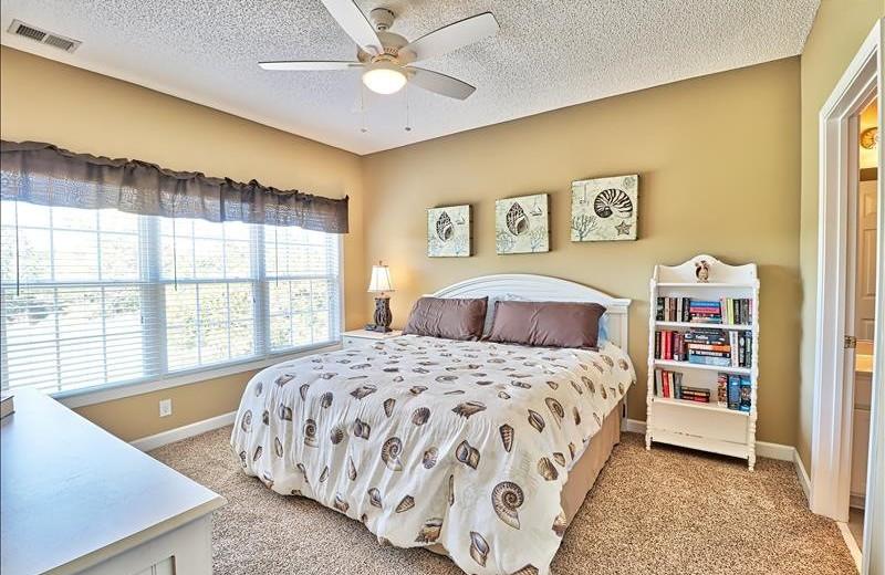 Rental bedroom at Barefoot Resort Rentals.