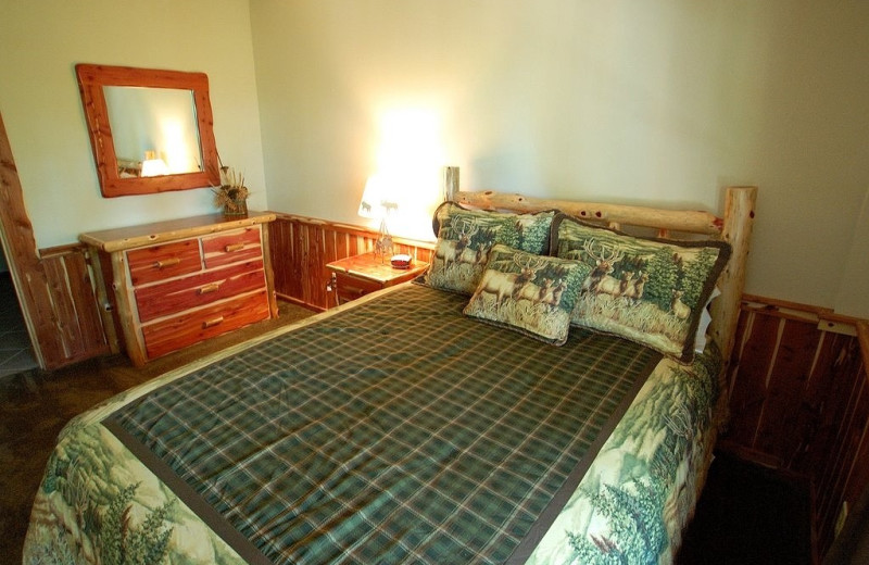 Cabin bed at Lake Forest Luxury Log Cabins.