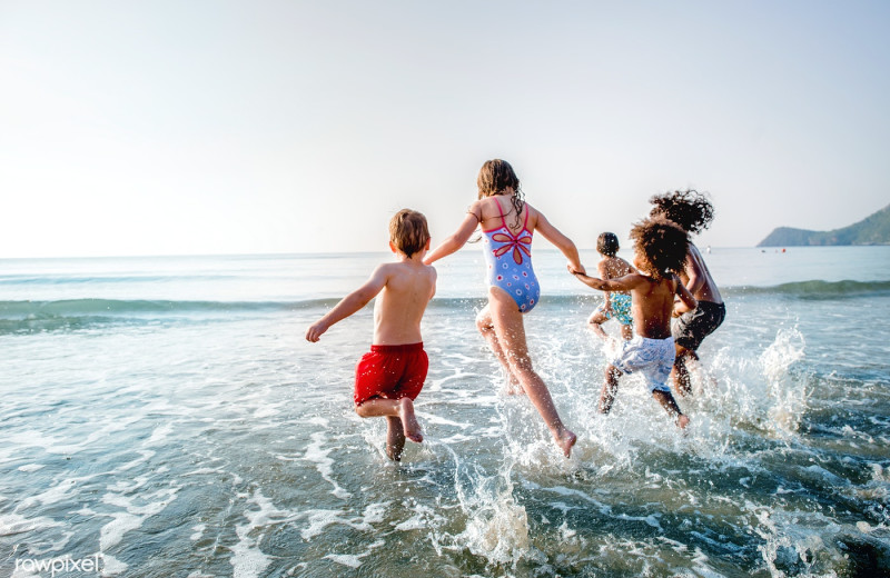 Kids running into water at La Isla - Casa del Mar.