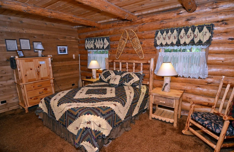 Cabin bedroom at North Country Vacation Rentals.