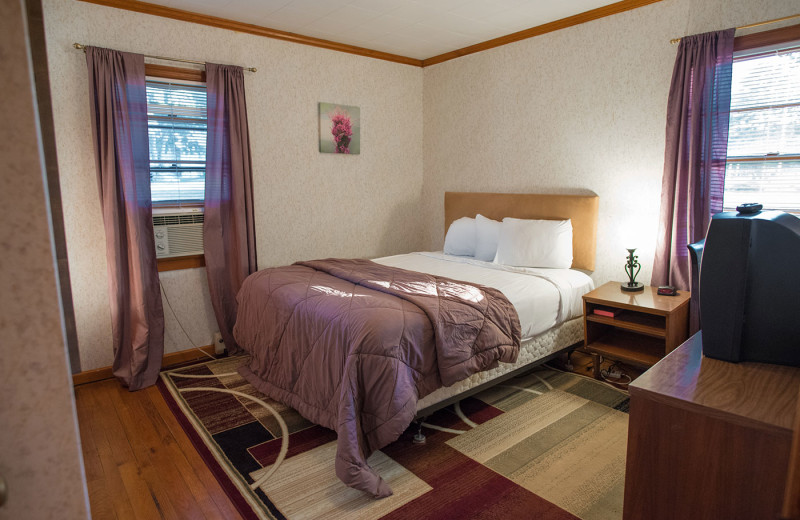 Cabin bedroom at Dunham's Bay Resort.