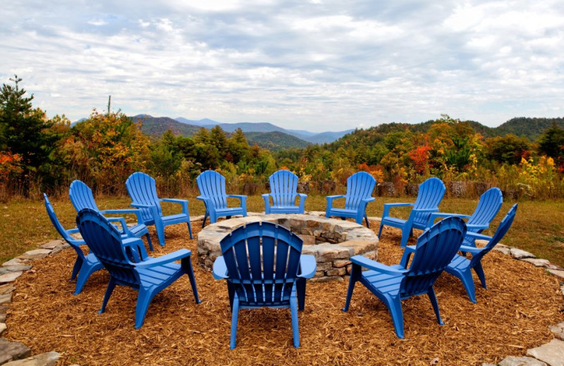 Chairs around fire pit at Splendor Mountain.