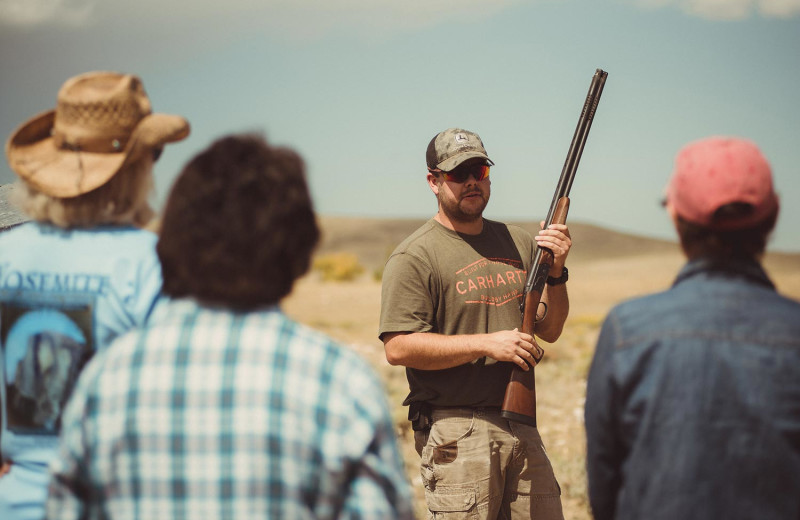 Shooting practice at Vee Bar Guest Ranch.