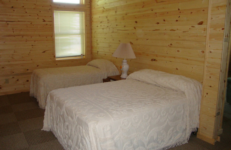 Cabin bedroom at Anchor Inn Resort.