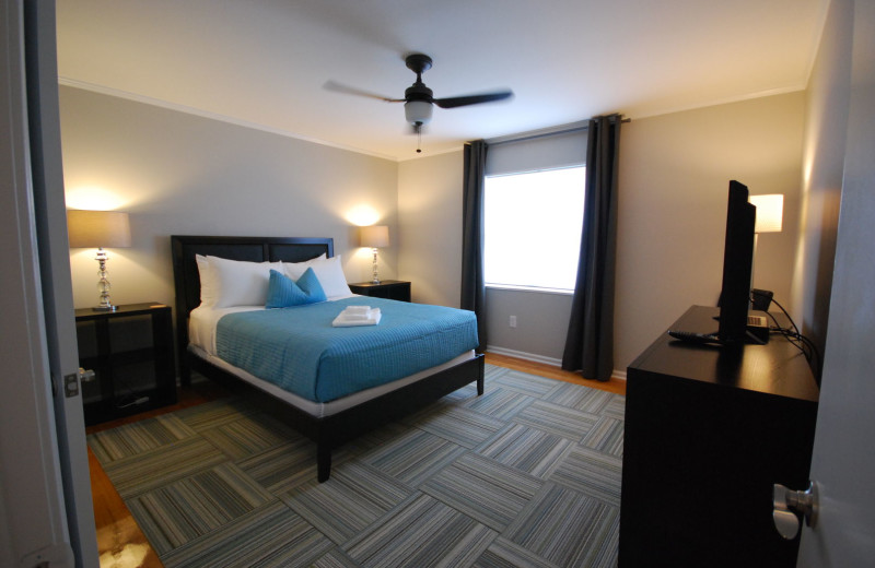 Guest bedroom at BCA Furnished Apartments.