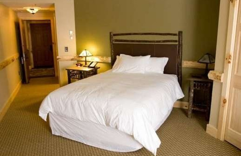 Guest bedroom at Hope Lake Lodge & Indoor Waterpark.